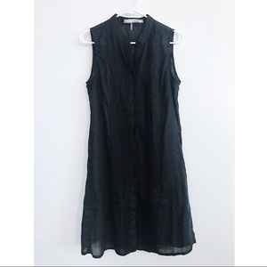 Black sleeveless dress.